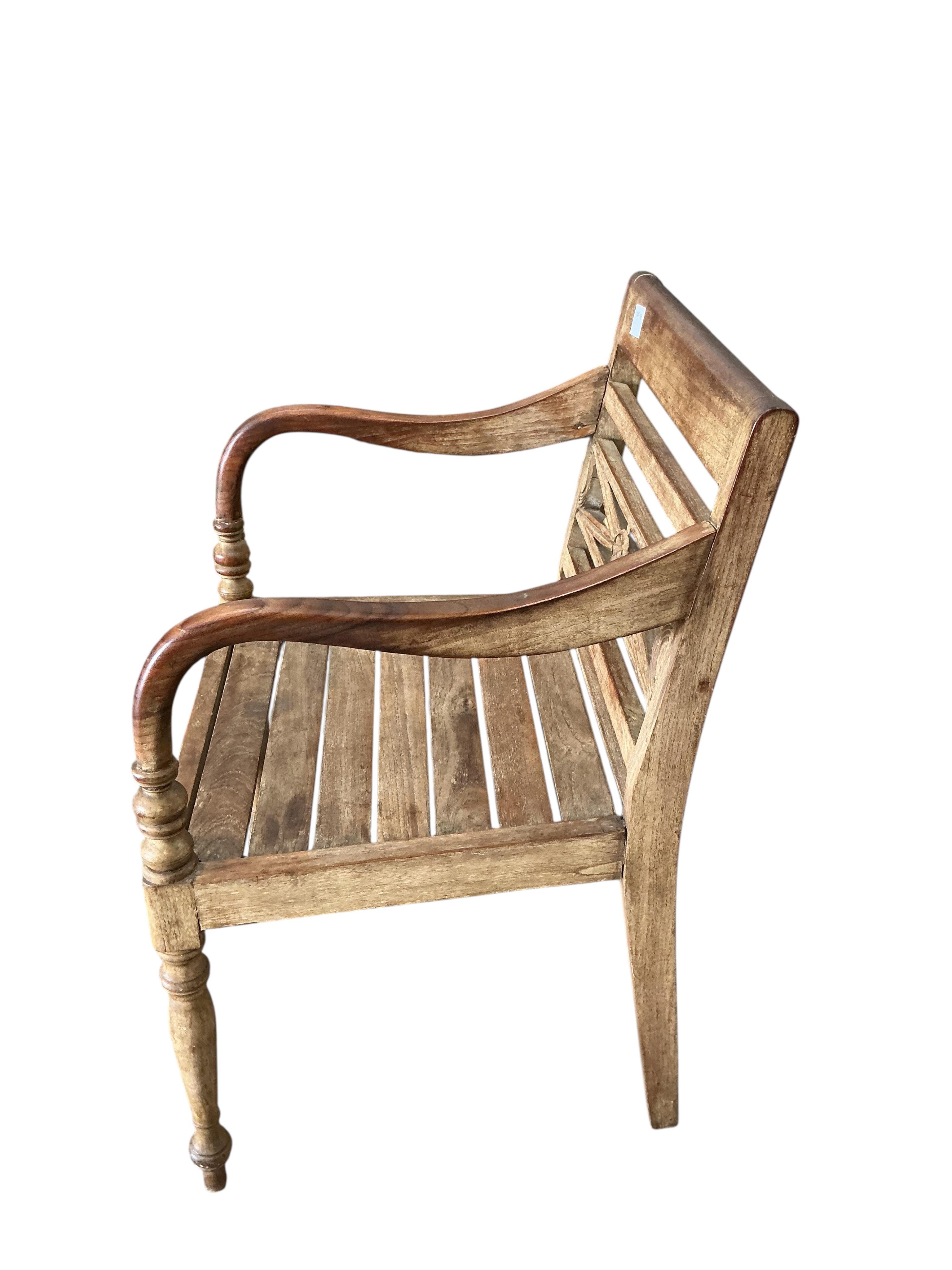 An Anglo-Indian hardwood elbow chair, width 53cm, height 84cm